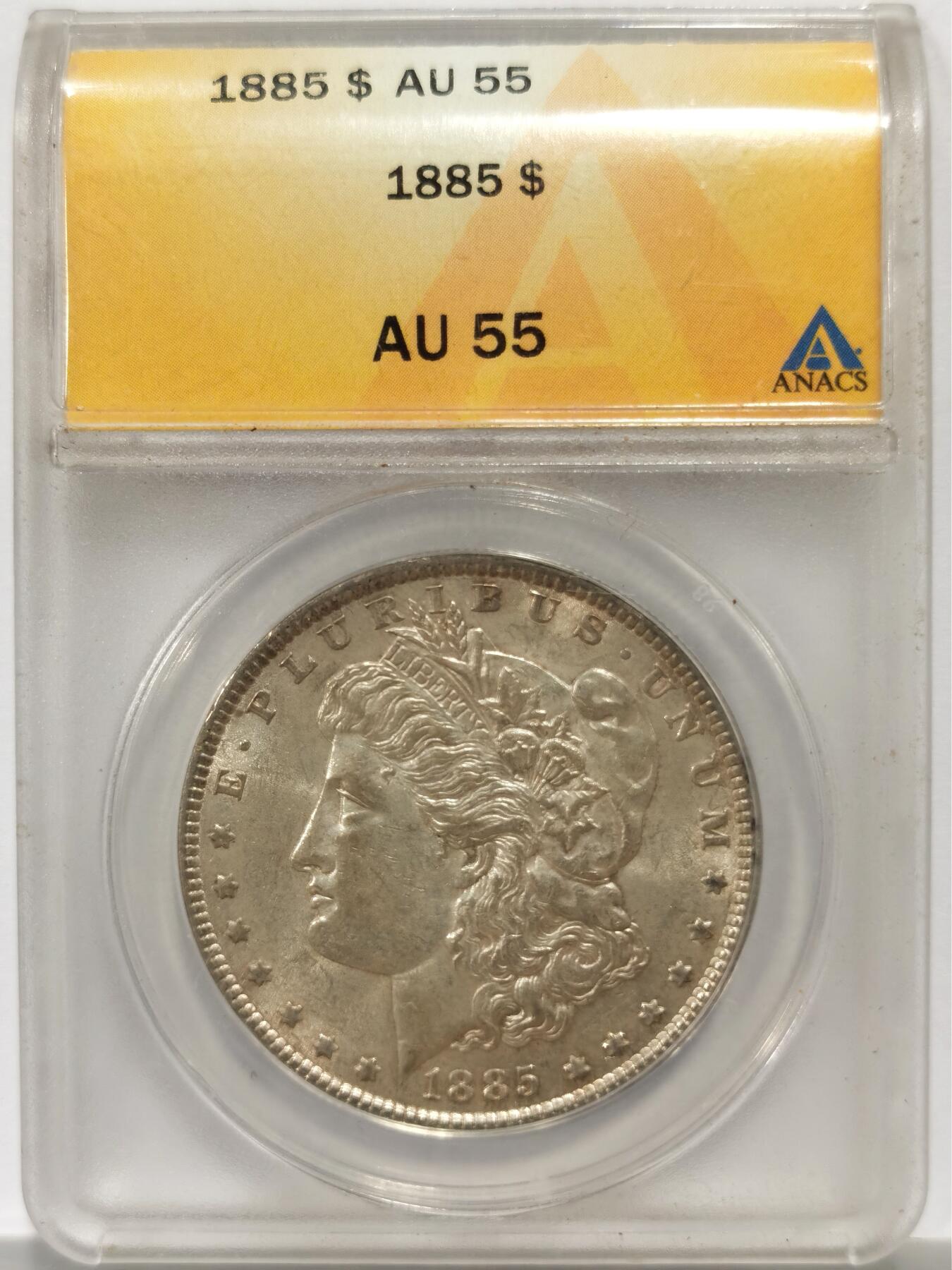 博洋堂世界钱币拍卖第139期（全场包邮） ANACS AU55 美国1885年摩根大银元。ANACS是仅次于PCGS和NGC的漂亮国第三大评级公司，其盒子币品质非常高，底板丝滑甚至还带有一层淡淡银霜，接近未流通状态。自由女神发丝细节直接拉满，根根缕缕分明，背面老鹰翅膀锐利，胸毛爆起，字体压力十足，完全透打，转光强烈，AU底板，MS光度，直边割手，滴水未下