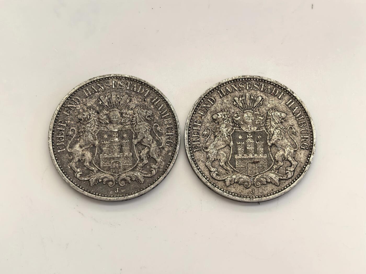 博洋堂世界钱币拍卖第139期（全场包邮） 德意志帝国汉堡自由市1909年双狮三马克银币一对，一枚AU清爽底板，一枚传世重金彩包浆，均是两面转光