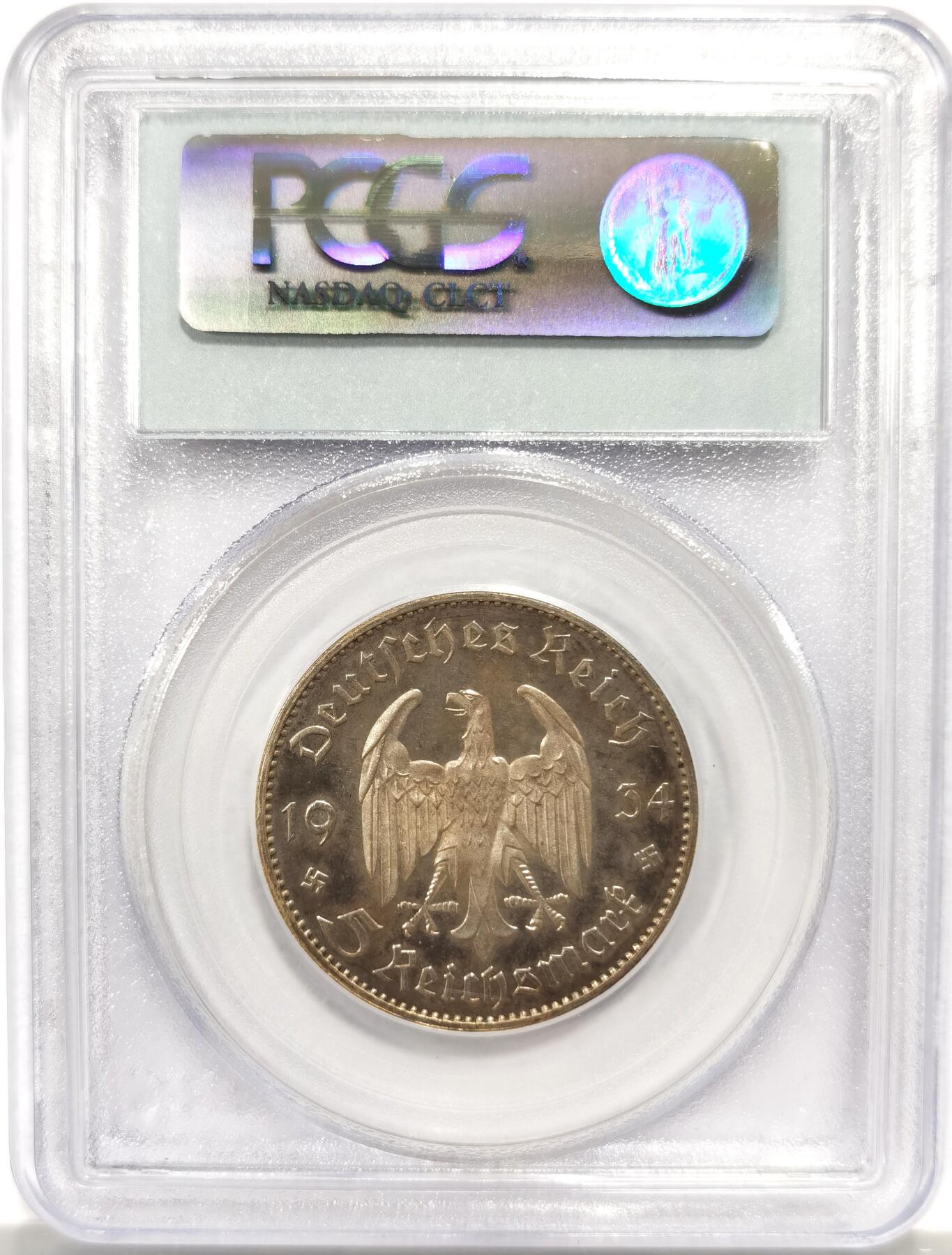 博洋堂世界钱币拍卖第139期（全场包邮） PCGS PR63CAM 1934年F版德国波茨坦教堂加字5马克精制 PCGS唯一冠军分，五彩包浆，强镜面感。此品种精制和高分5马克难度极大，此枚深度镜面喷砂，CAM级别一币难求，叠加五彩状态堪称一绝，一步到位的收藏级精品