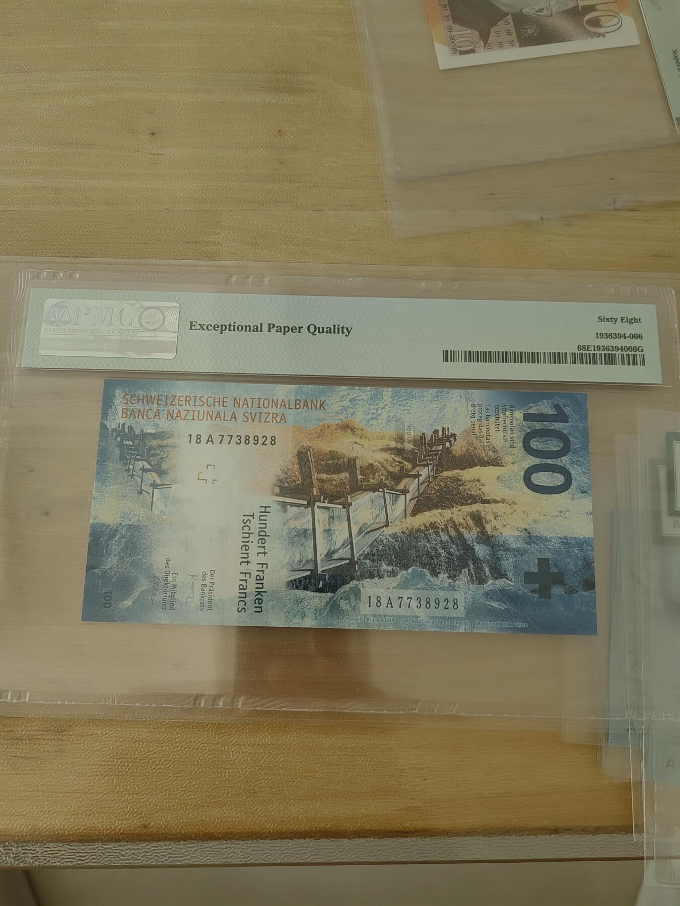 斯努比★部分UNC外币处理 瑞士法郎100 A冠 18A7738928 PMG68 高分