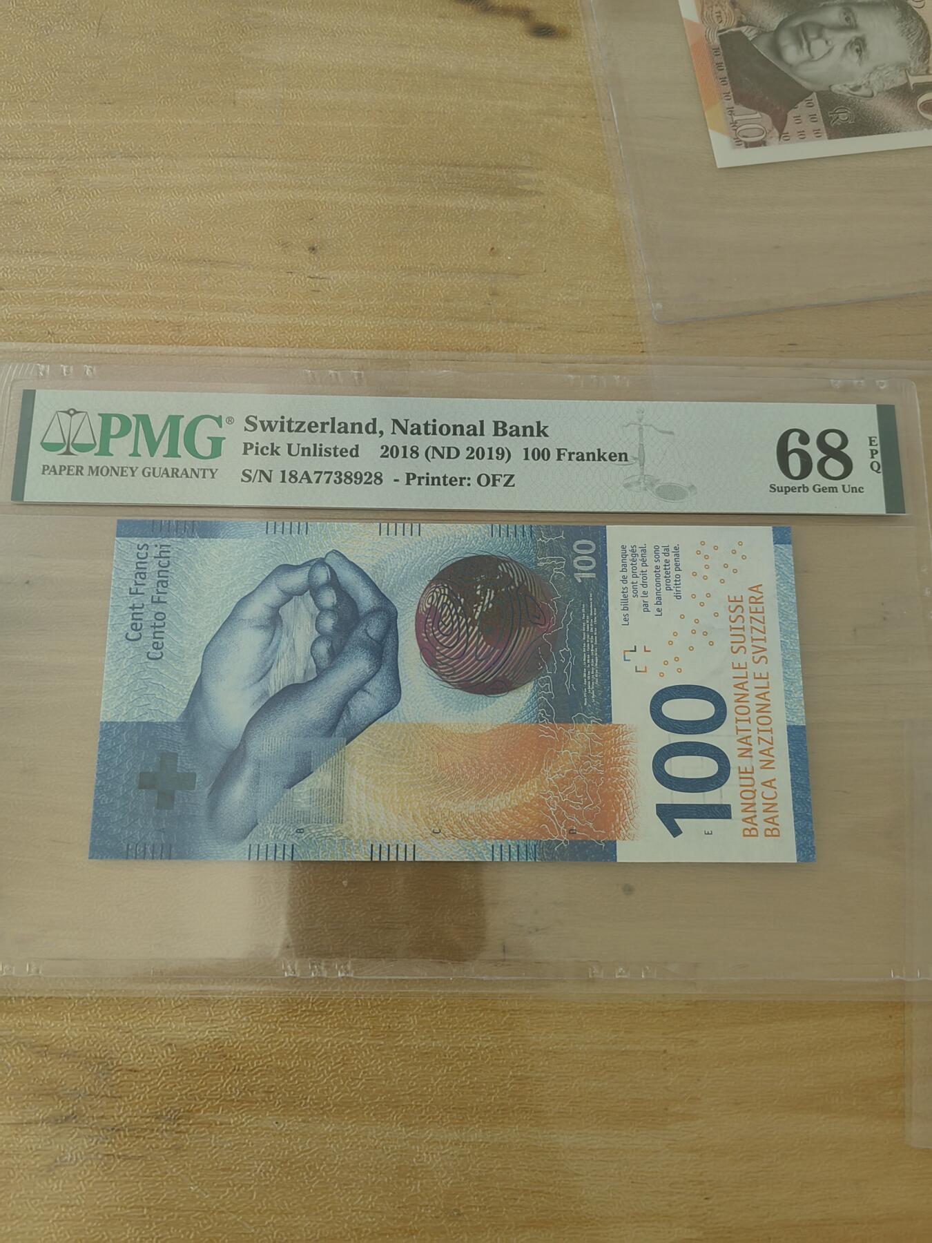斯努比★部分UNC外币处理 瑞士法郎100 A冠 18A7738928 PMG68 高分