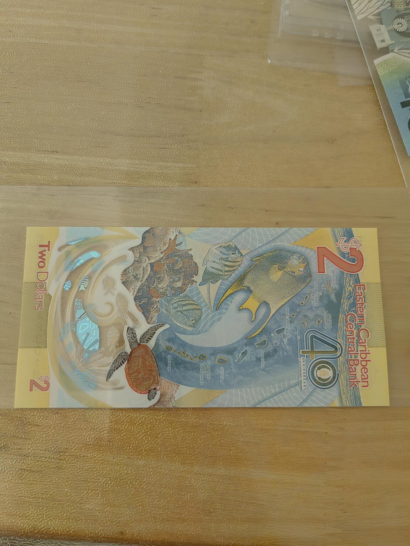 斯努比★部分UNC外币处理 东加勒比AA830199 获奖钞