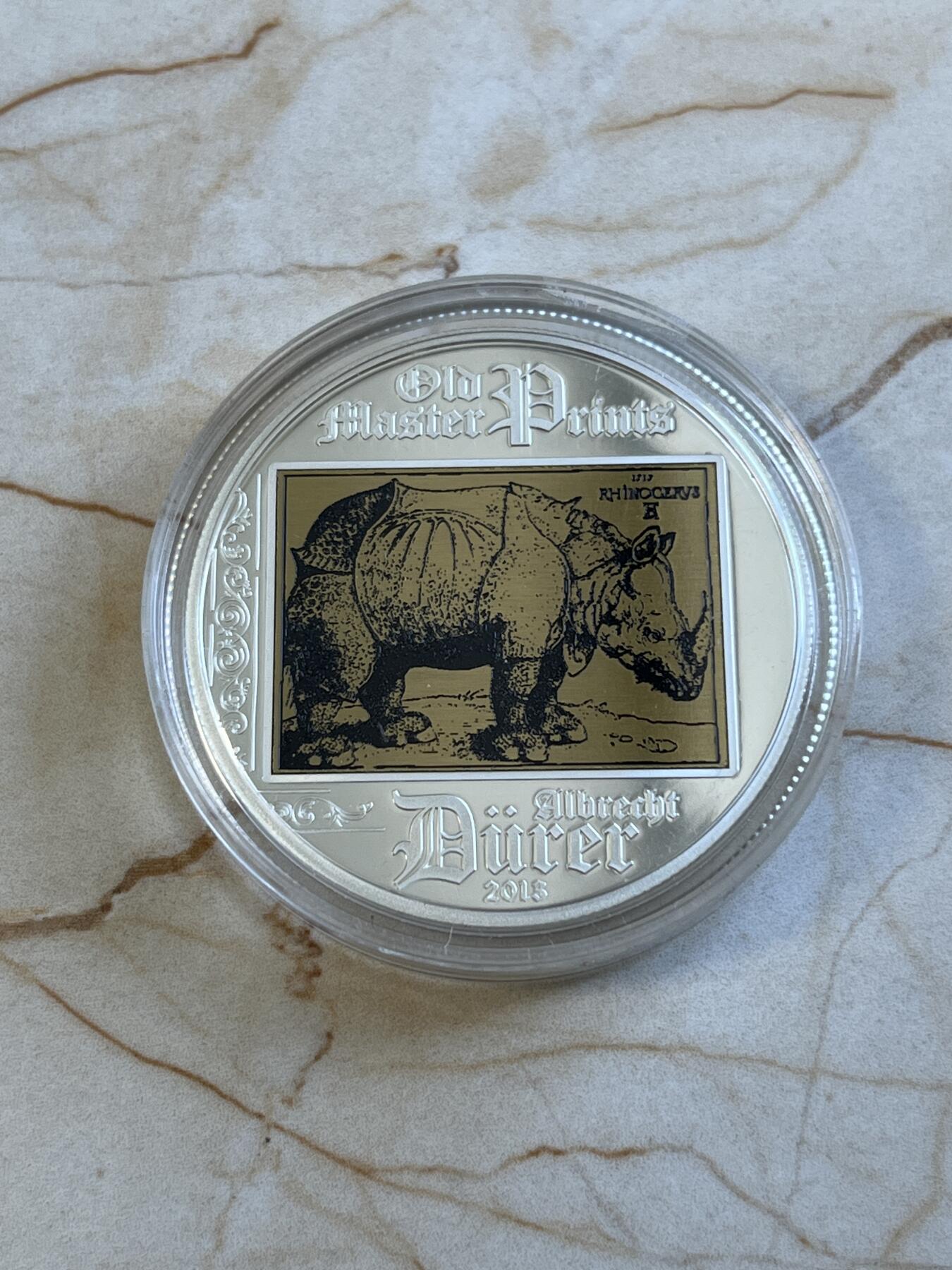 第175期拍卖【长期征集拍品】  库克2013年《丢勒的犀牛》木板画复刻精制镶嵌铜雕版纪念银币，20克，925银，发行量2500枚