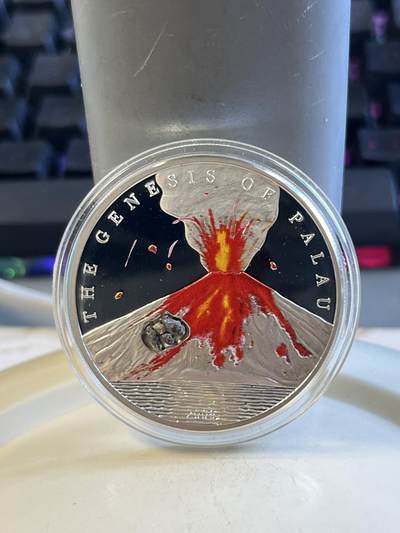 第175期拍卖【长期征集拍品】 - 帕劳2006年镶嵌皮拉博图火山爆发岩彩色精制银币，925银，25克