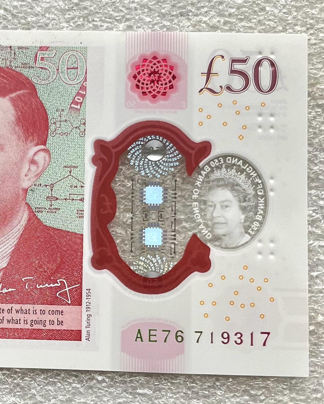 日本战争债券、英国伊二女王末版纸币套、哈萨克斯坦2万坚戈纪念钞、民国钞、台湾经济振兴券，台湾原住民系列套币/生肖银币，新疆喀什饷银五钱，康熙/光绪铜钱，哈萨克斯坦精制纪念银币，荷属东印度爪哇岛小铜块。彼得堡世界钱币勋章拍卖第133期 英国2020年50镑纸币塑料钞、艾伦·图灵，UNC全新品相、透明窗口完好