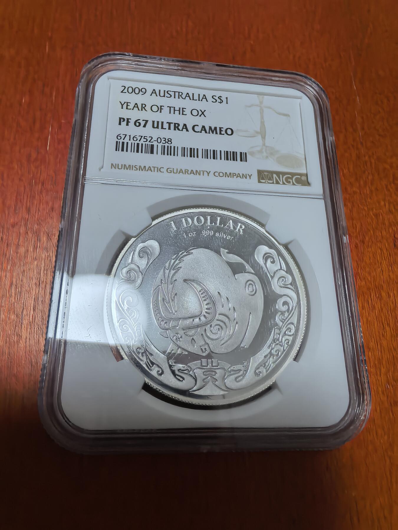 长老汇蛇年精选第四十五场拍卖 2009 澳大利亚牛年1澳元精制银币，NGC PF67UC，季军，更高5枚，皇家造币厂出品，克书未收录