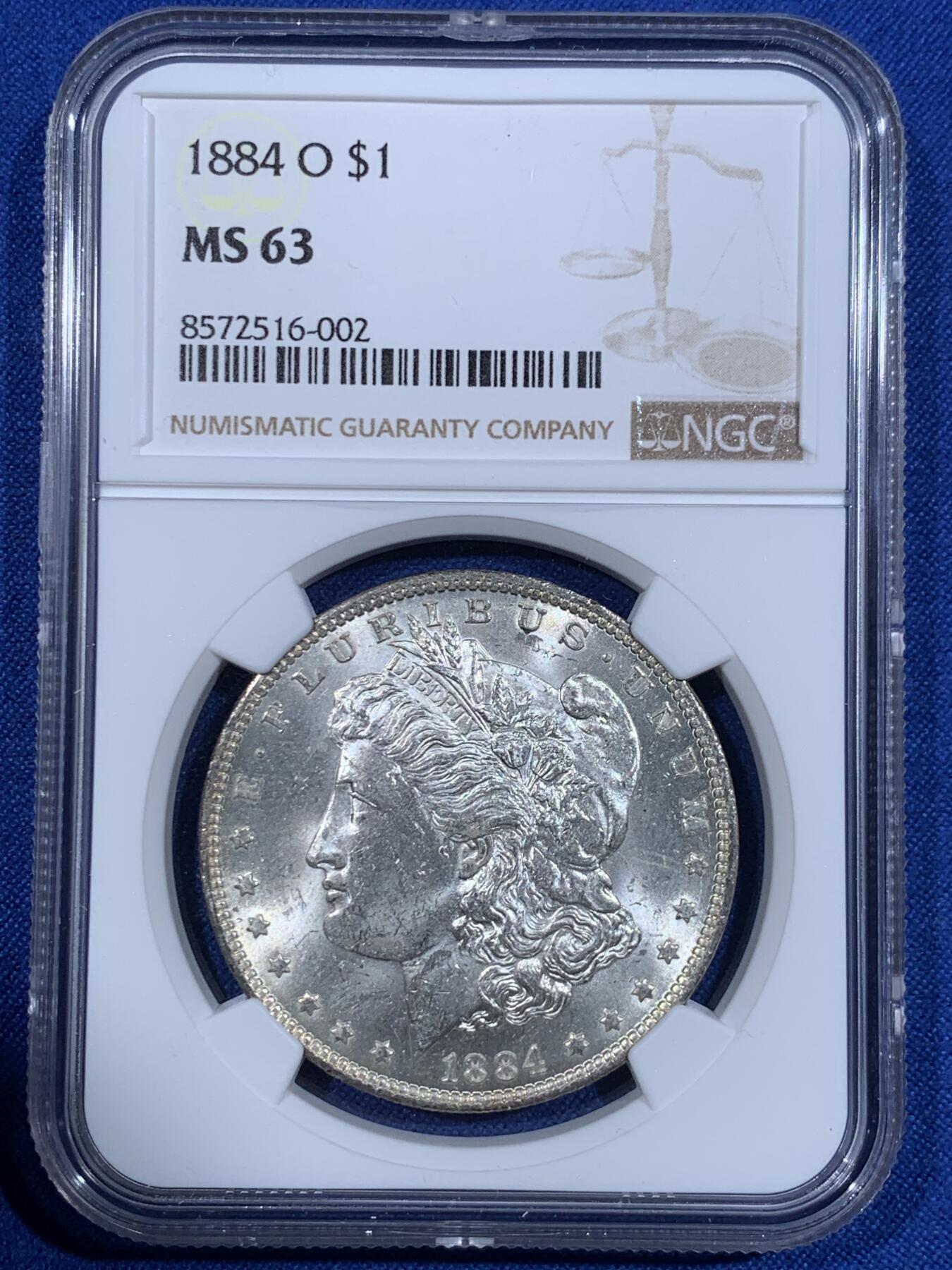 《竞宝斋》第418场 周日，周一，2场连拍 （全场包邮） NGC MS63 美国1884年O版摩根银币，币面干净利落，非常漂亮