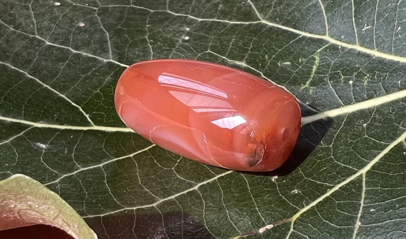 零元拍：南红玛瑙桶珠，约7.4克，25/13MM，颜色以实物为准。