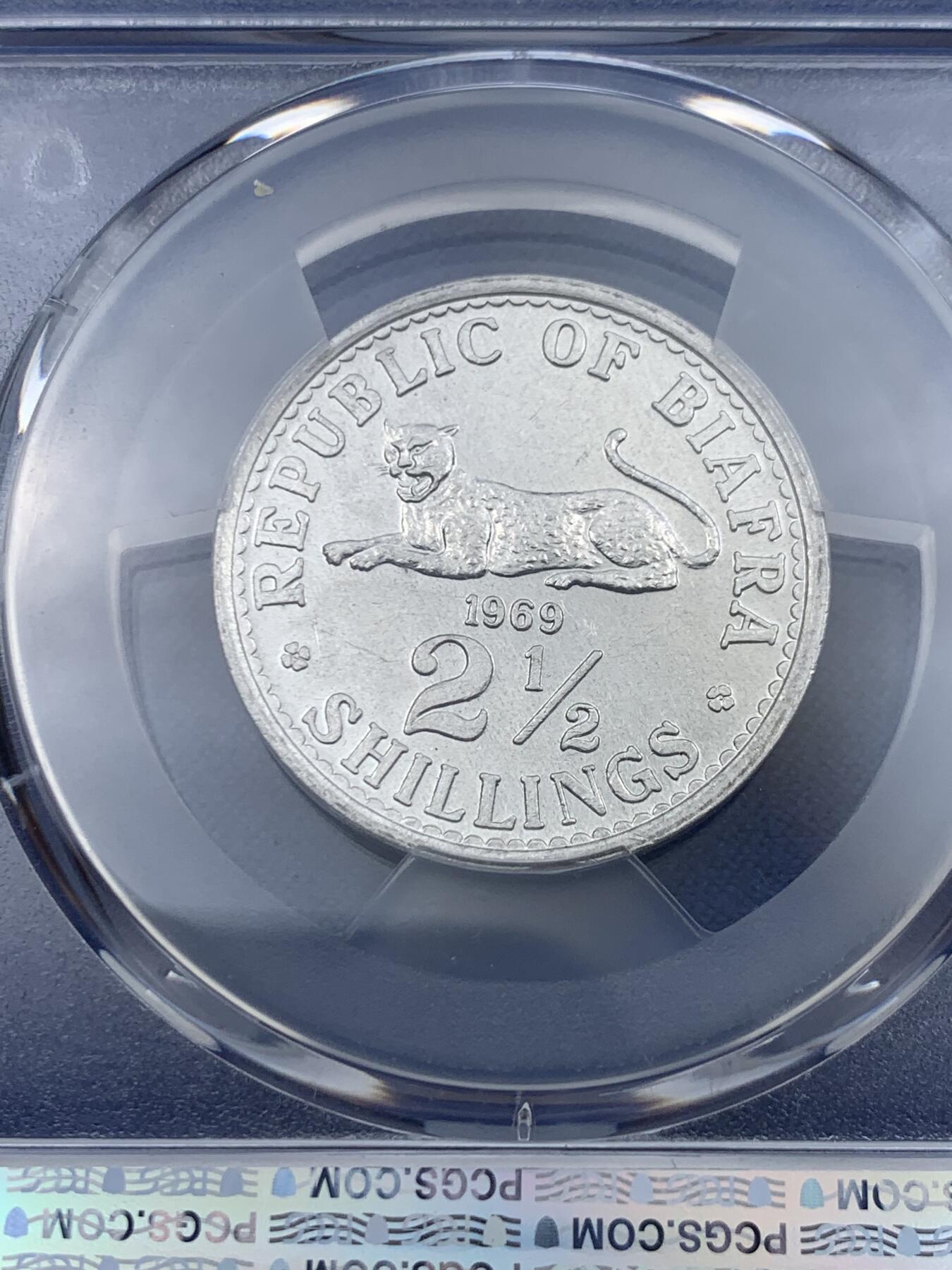 《竞宝斋》第418场 周日，周一，2场连拍 （全场包邮） PCGS MS63 1969年比夫拉2.5分铝币，成立不到4年 比夫拉货币发行量不多，正面的卧豹非常有本地特色，PC有所低评