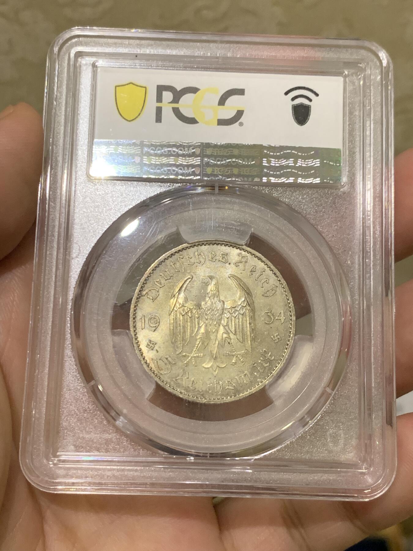 《竞宝斋》第418场 周日，周一，2场连拍 （全场包邮） PCGS MS64 德国 1934A日期版教堂马克 分水岭分数 正面五彩包浆 背面车轮转光