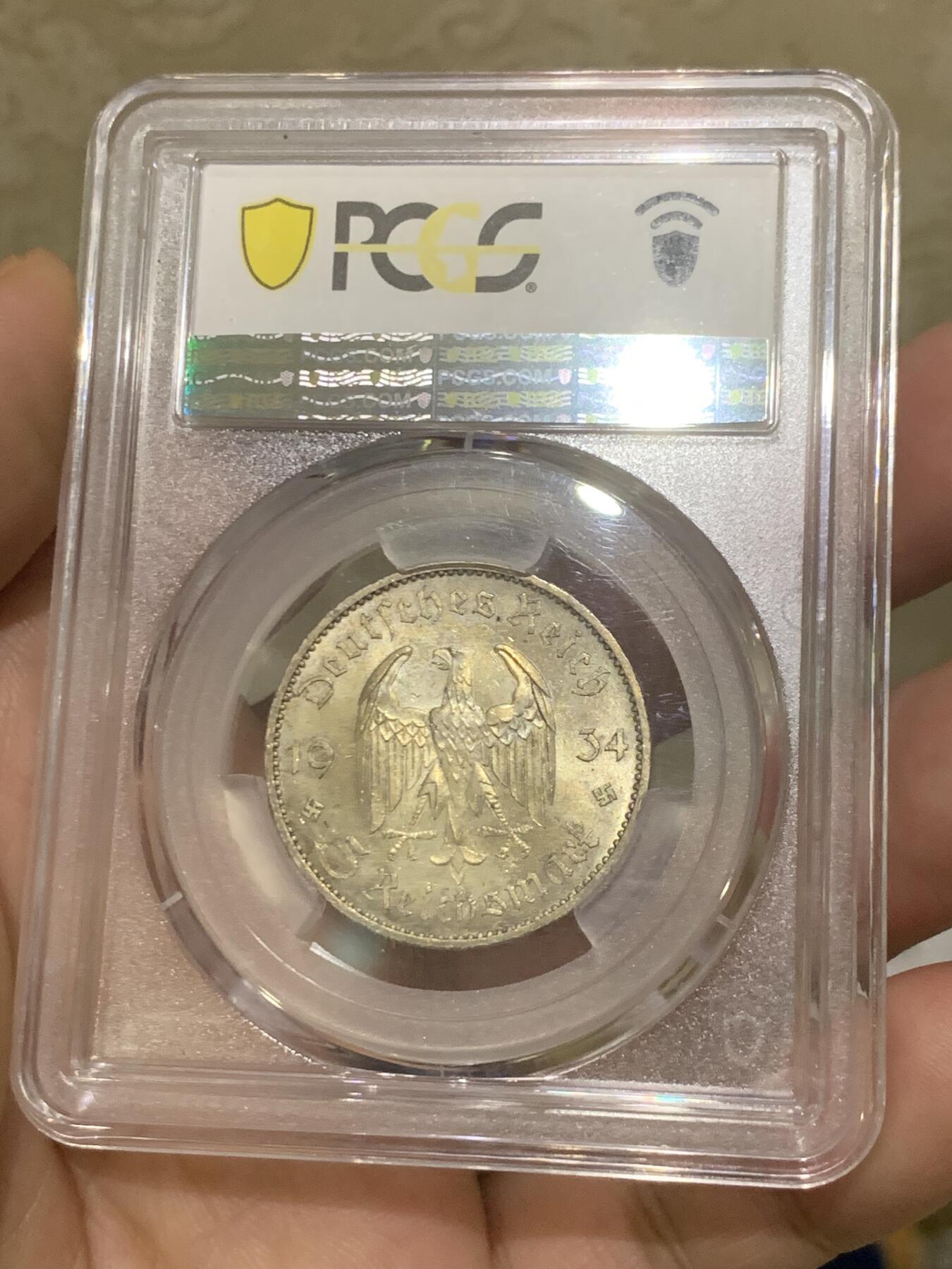 《竞宝斋》第418场 周日，周一，2场连拍 （全场包邮） PCGS MS64 德国 1934A日期版教堂马克 分水岭分数 正面五彩包浆 背面车轮转光
