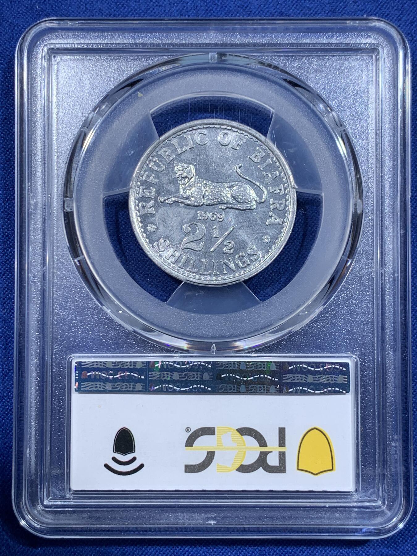《竞宝斋》第418场 周日，周一，2场连拍 （全场包邮） PCGS MS63 1969年比夫拉2.5分铝币，成立不到4年 比夫拉货币发行量不多，正面的卧豹非常有本地特色，PC有所低评