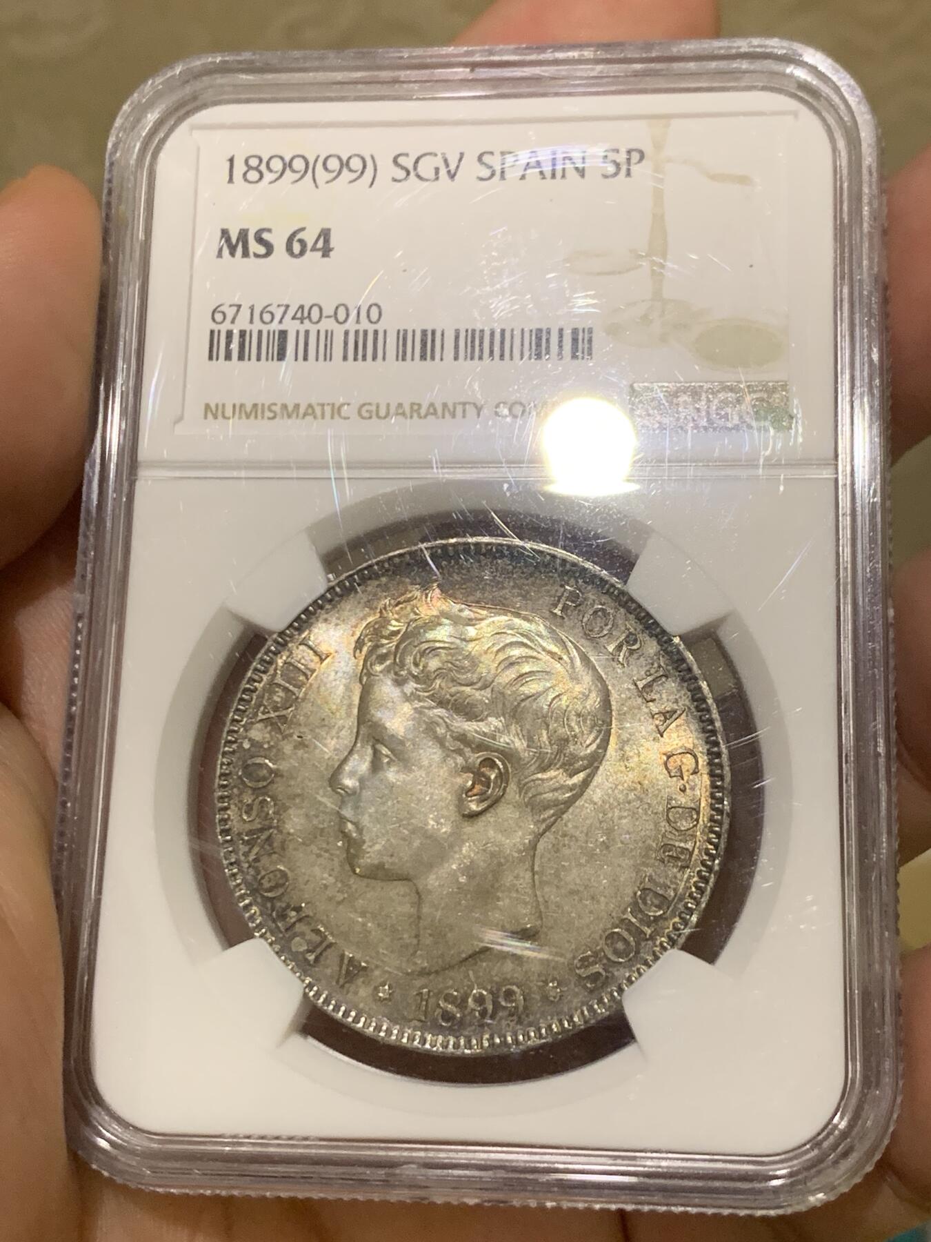 《竞宝斋》第418场 周日，周一，2场连拍 （全场包邮） NGC MS64 西班牙1899年阿方索十三世小孩头5比塞塔双柱银币 包浆温润 双面同时拥有重彩和鲜艳光泽 值得入藏的品相。