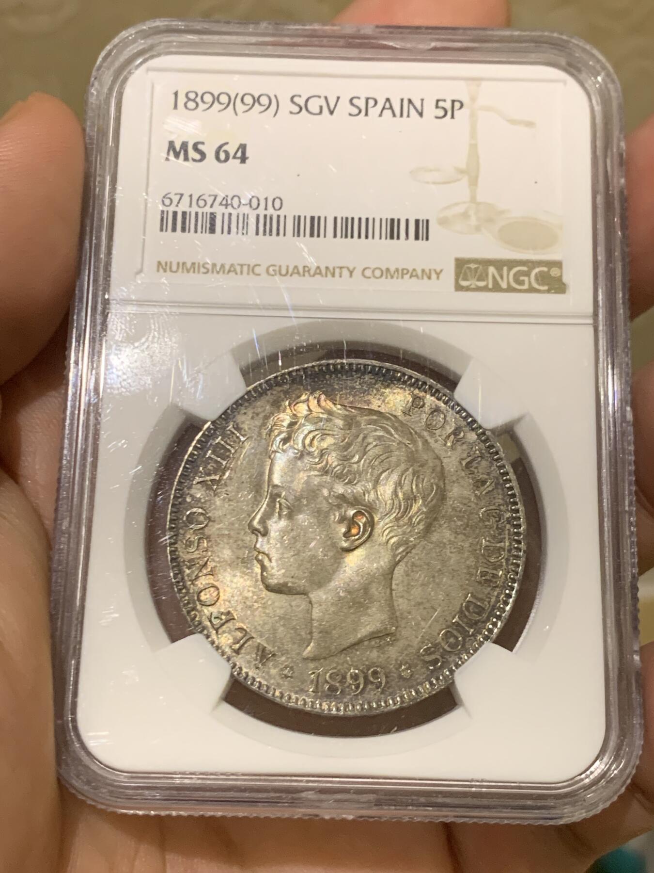 《竞宝斋》第418场 周日，周一，2场连拍 （全场包邮） NGC MS64 西班牙1899年阿方索十三世小孩头5比塞塔双柱银币 包浆温润 双面同时拥有重彩和鲜艳光泽 值得入藏的品相。