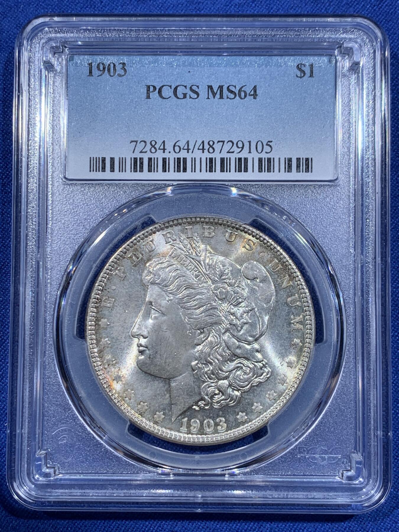 《竞宝斋》第418场 周日，周一，2场连拍 （全场包邮） PCGS MS64 美国 1903年 1美元 摩根银币 后期少年 带点环彩 状态不错