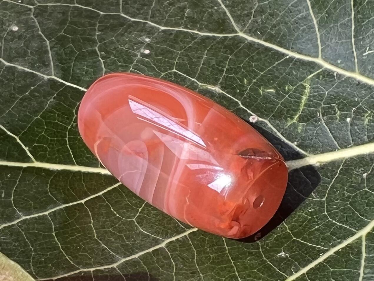 零元拍：南红玛瑙桶珠，约7.4克，25/13MM，颜色以实物为准。