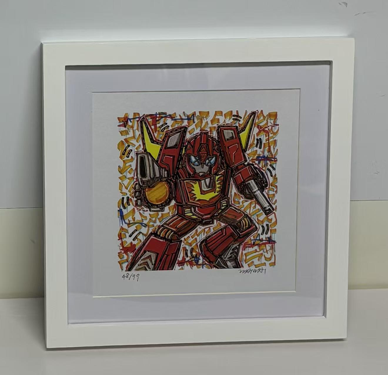 零元拍：歪歪亲笔签名 OWSON 系列作品装饰画《变形金刚》，已做装裱 木框相框尺寸28/28CM。因展品出展，镜框或亚克力可能有轻微划痕，介意勿拍