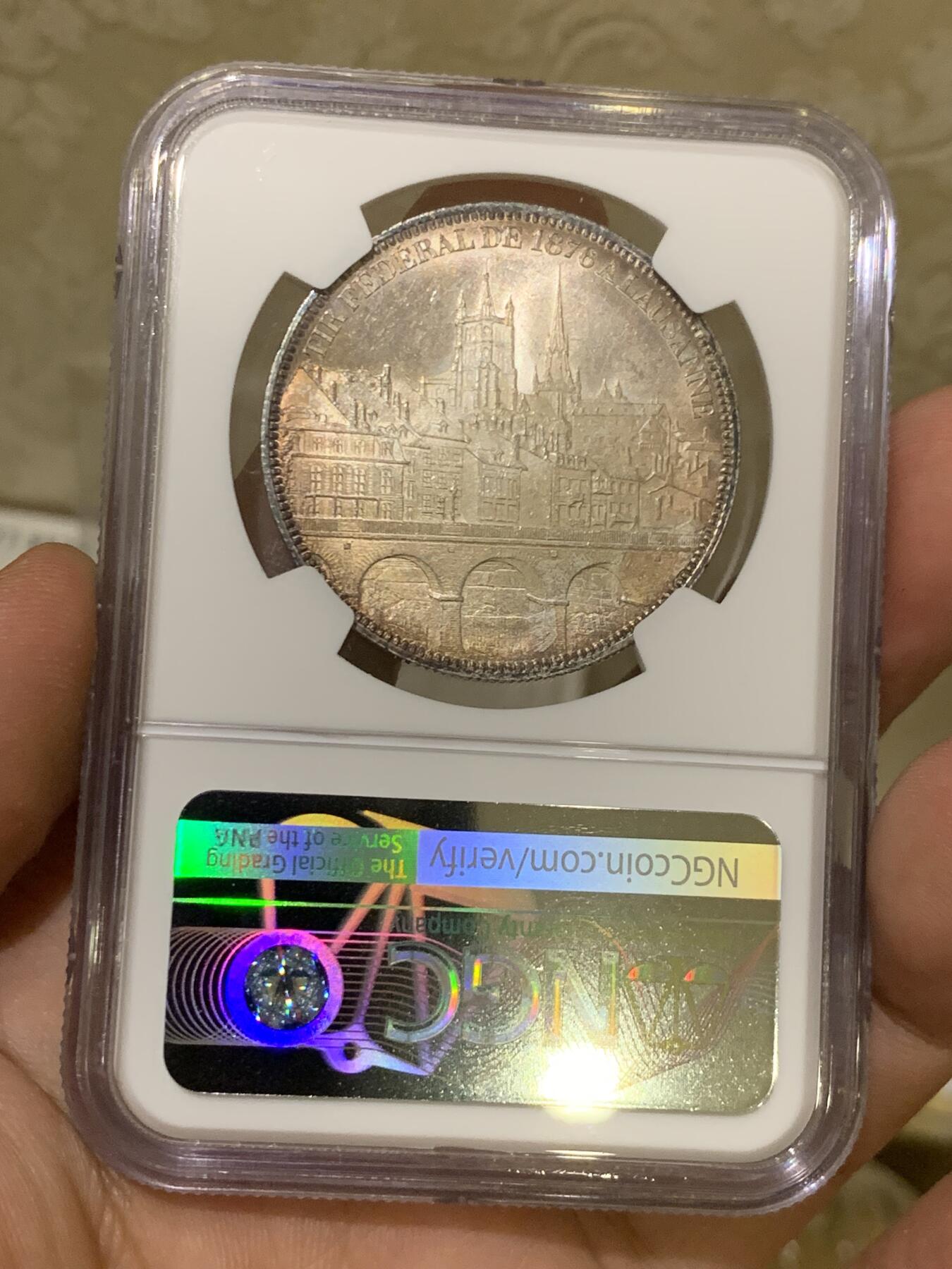 《竞宝斋》第419场 周日，周一，2场连拍 （全场包邮） NGC-MS64 瑞士1876年洛桑射击节纪念 5法郎银币 原味金彩，状态一流，背面的城市建筑好似掩映在晚霞中