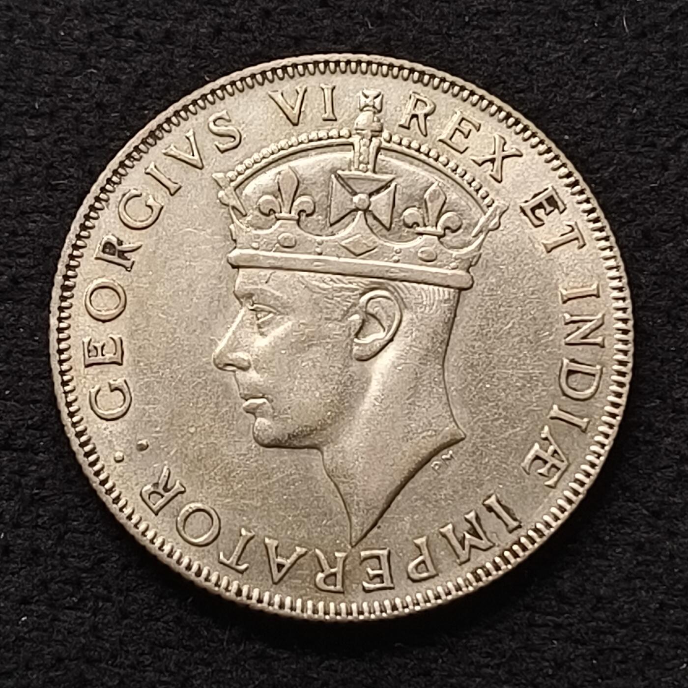 【全场包邮】纯粹捡漏拍散币 英属东非1941年乔治六世1先令银币