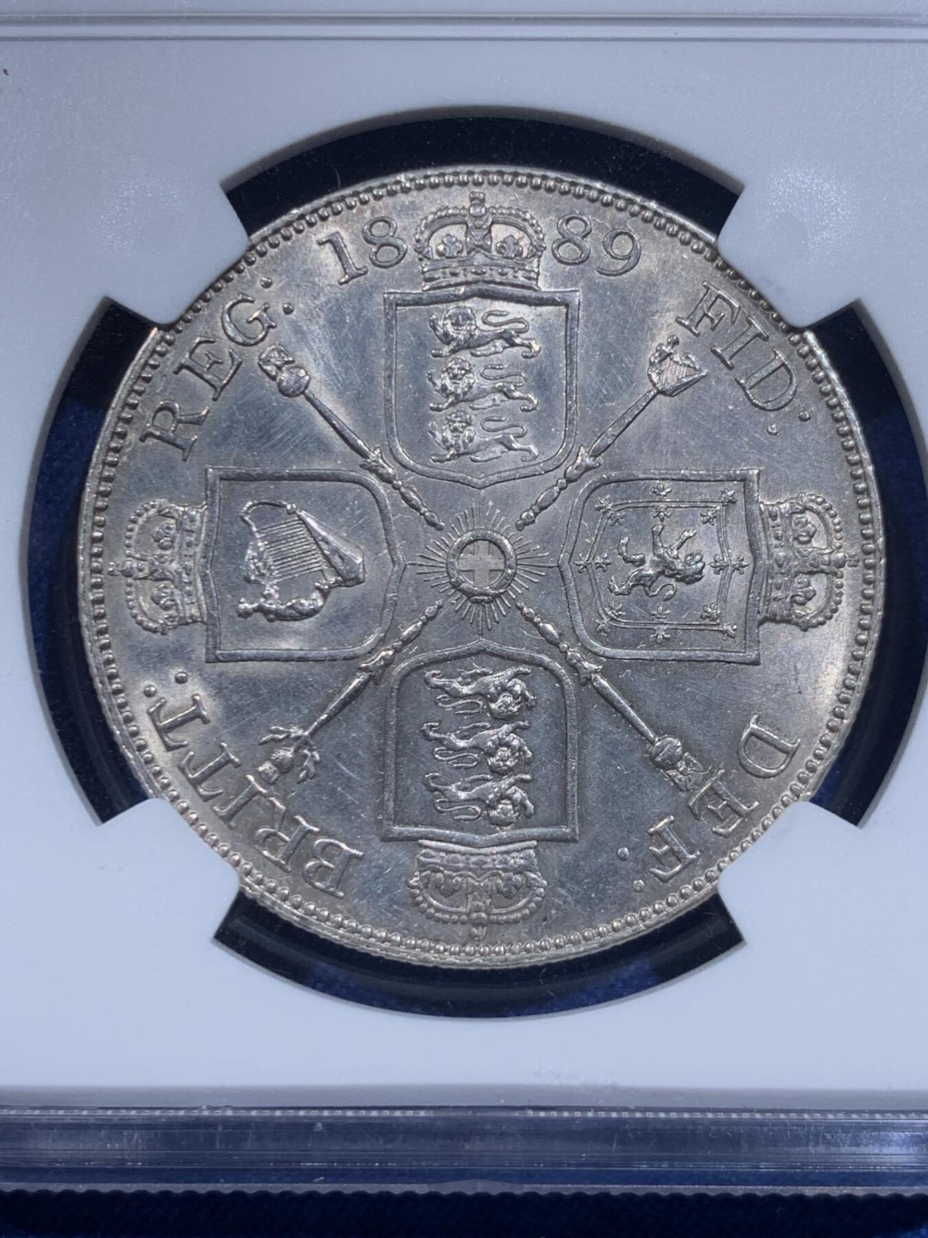 《竞宝斋》第419场 周日，周一，2场连拍 （全场包邮） NGC UNC 英国1889年维多利亚高冠双弗洛林 比1887少见很多 底板干净车轮转光 高点细节状态极佳 没分太可惜了
