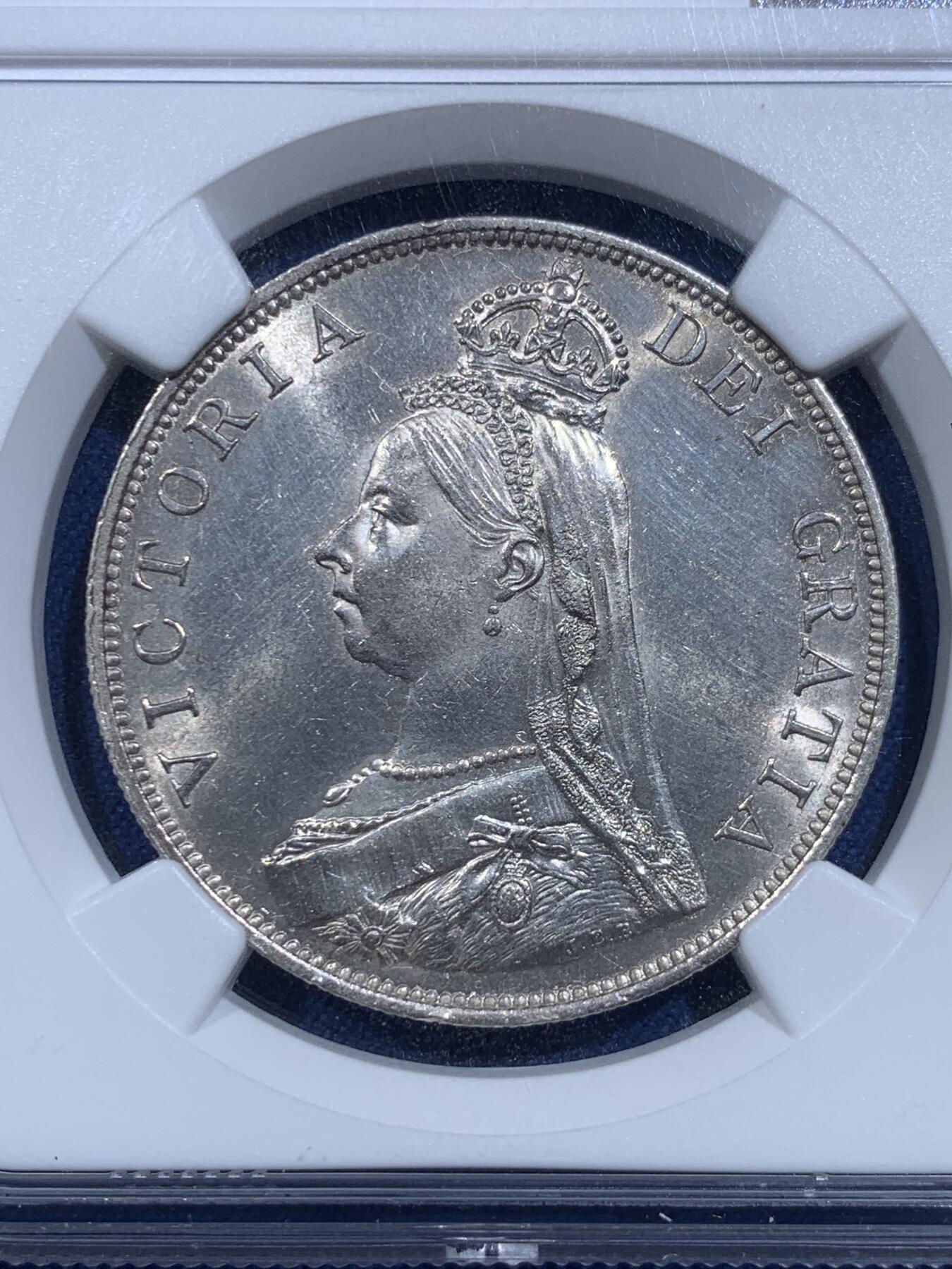 《竞宝斋》第419场 周日，周一，2场连拍 （全场包邮） NGC UNC 英国1889年维多利亚高冠双弗洛林 比1887少见很多 底板干净车轮转光 高点细节状态极佳 没分太可惜了