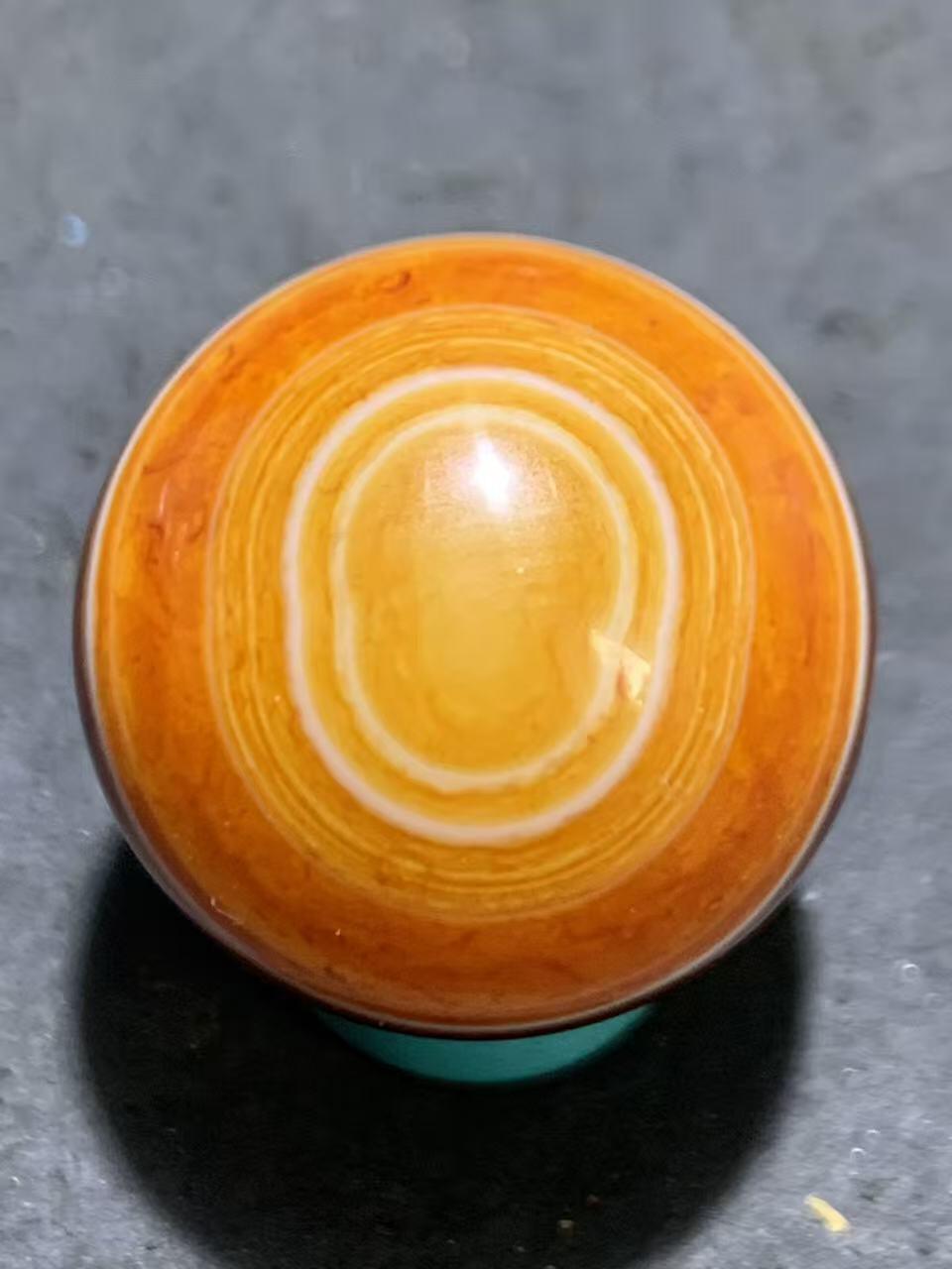 精美双天眼高玉化缠丝玛瑙2.0圆珠一颗。