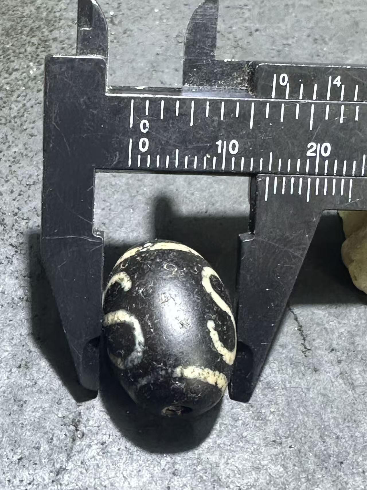 仅此一颗，藏传金钱钩随形天珠一颗，