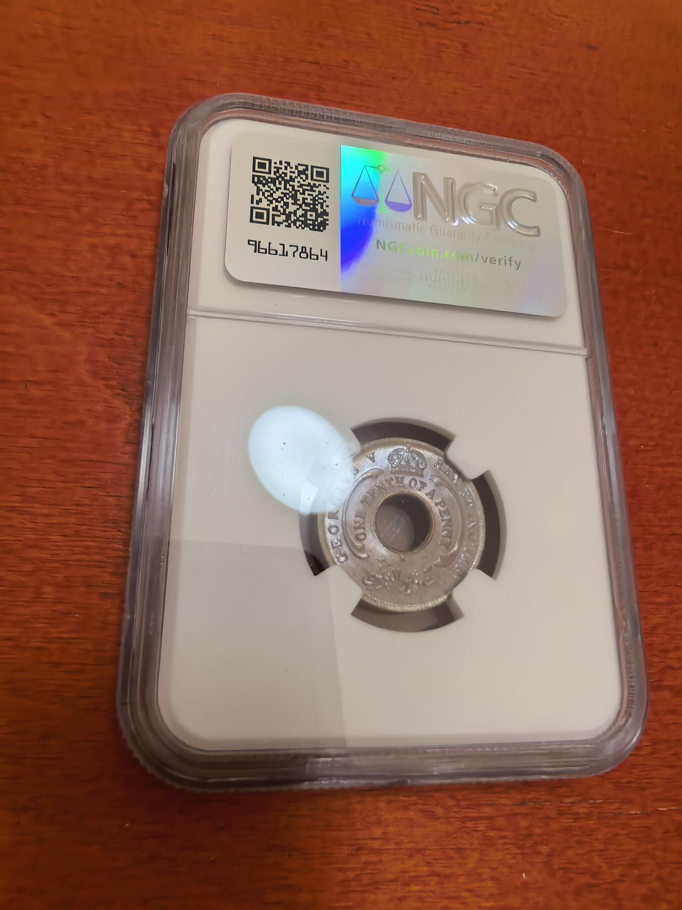 长老汇蛇年精选第四十七场拍卖 1911西非1/10便士中空铜镍币，NGC MS64
