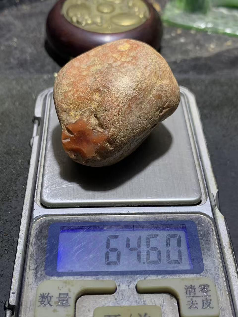 精美红皮开窗料柿子红南红玛瑙原石一颗