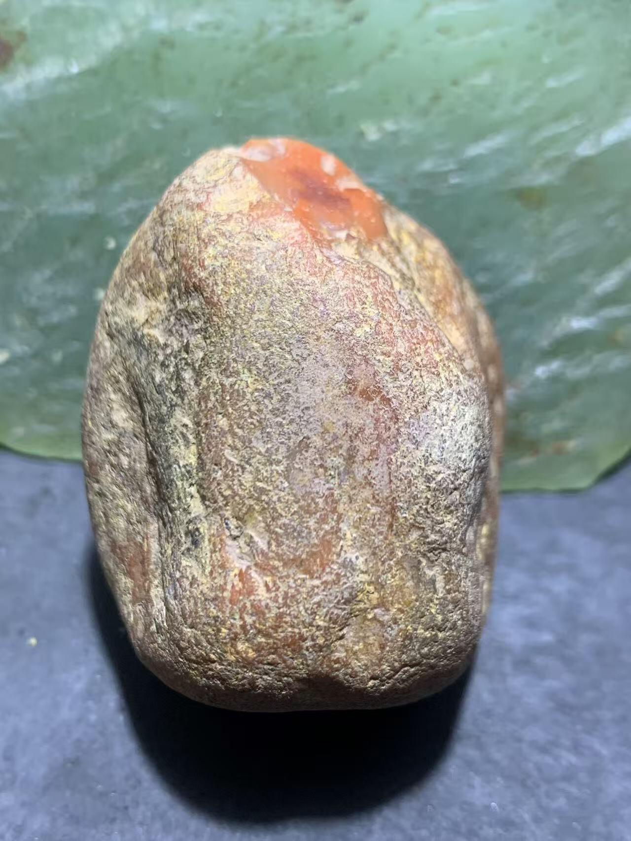 精美红皮开窗料柿子红南红玛瑙原石一颗