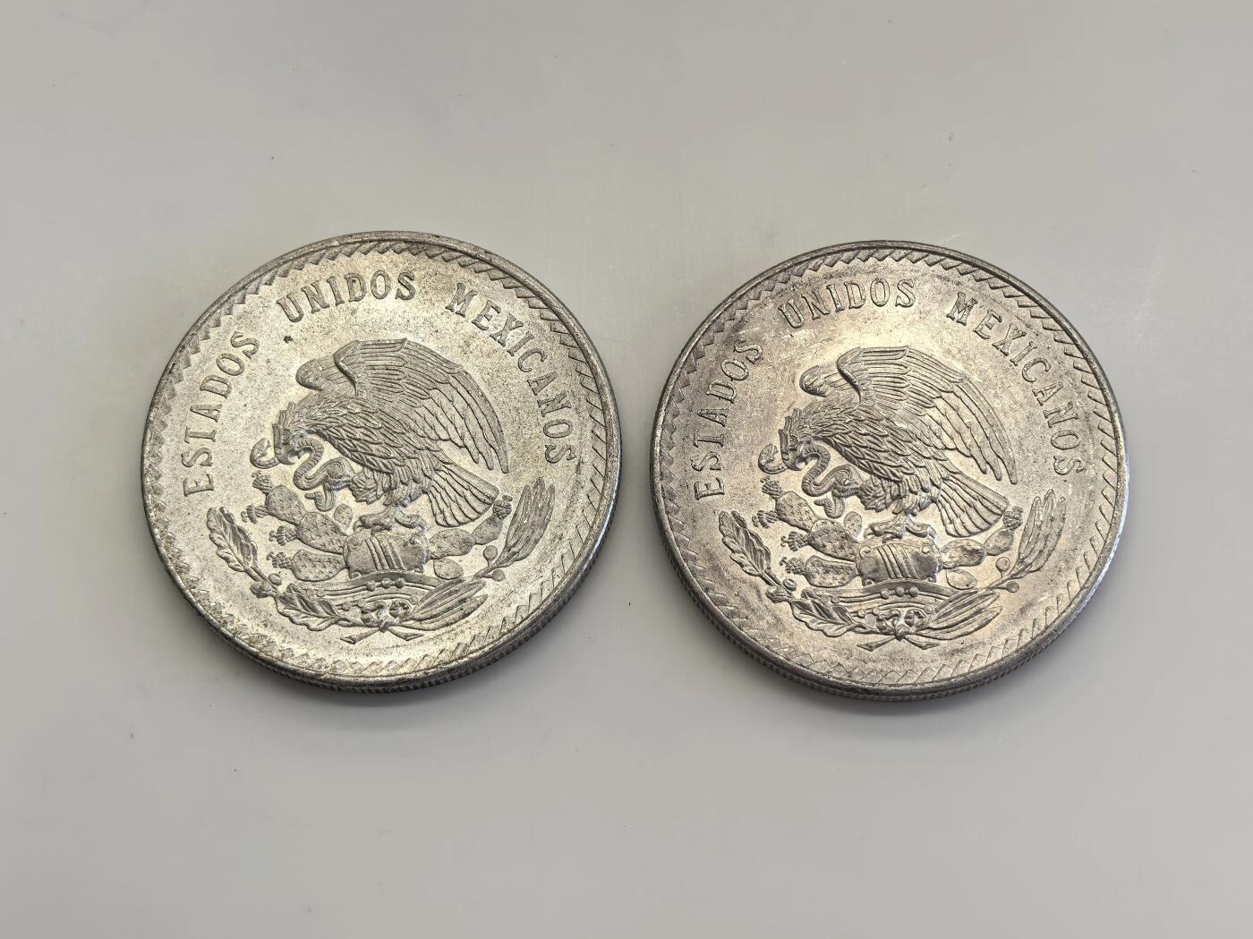 博洋堂世界钱币拍卖第140期（全场包邮） 两枚墨西哥1948年玛雅酋长鹰洋大银元，标准MS63品相，状态极好，双面车轮大转光。视频已经显示得很清楚。