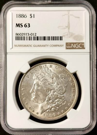 甄臻铺-世界币章拍卖（第34期），送拍享返佣金等优惠多多 - NGC-MS63 美国1886摩根银元 带一点淡淡的包浆 底板不错 个人送评 上海N有点压分了 状态很不错