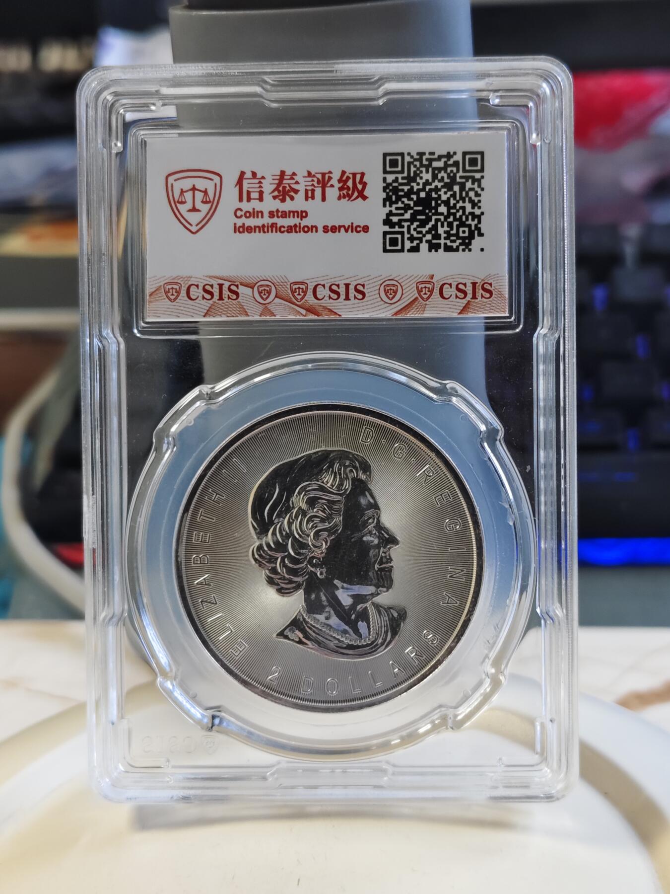 第175期拍卖【长期征集拍品】 加拿大2016年月下狼嚎3/4盎司纪念银币CSIS-MS70,9999银，标签发行国家错误
