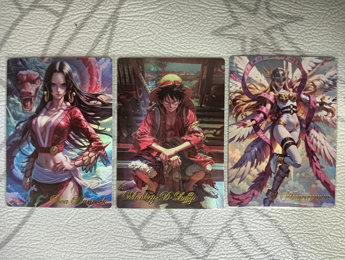 花开卡拍第39期（9月21号周日截拍，品控勿拍!!!拍品不寄存，运费5元，自制卡难免瑕疵，可能存在轻微撞角爆边等出厂瑕疵，品控介意勿拍！） 海贼王卡牌 女帝+路飞 还有天女兽 磨砂彩闪
