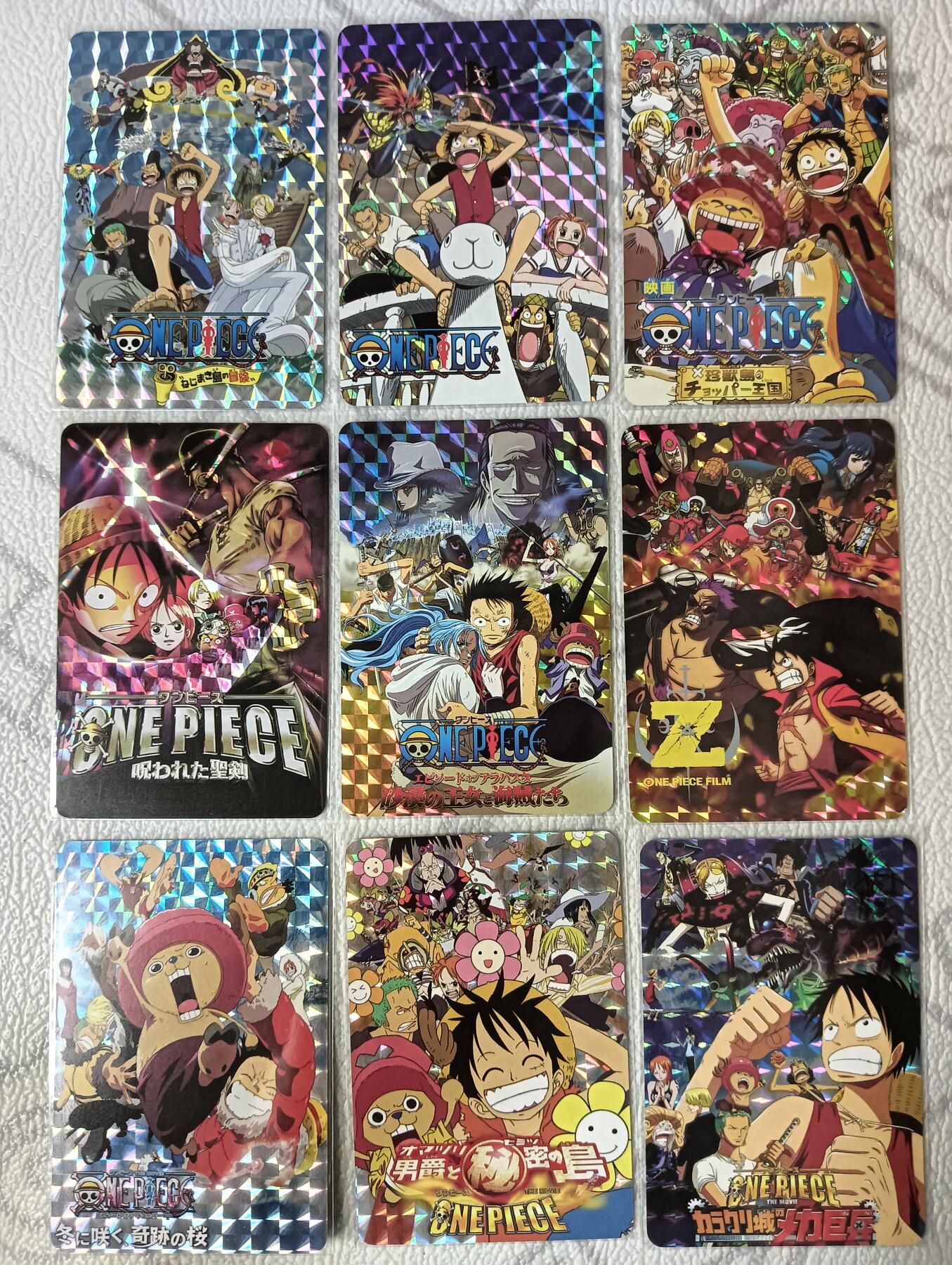 花开卡拍第39期（9月21号周日截拍，品控勿拍!!!拍品不寄存，运费5元，自制卡难免瑕疵，可能存在轻微撞角爆边等出厂瑕疵，品控介意勿拍！） 海贼王卡牌 多人合集9张打包 格子闪