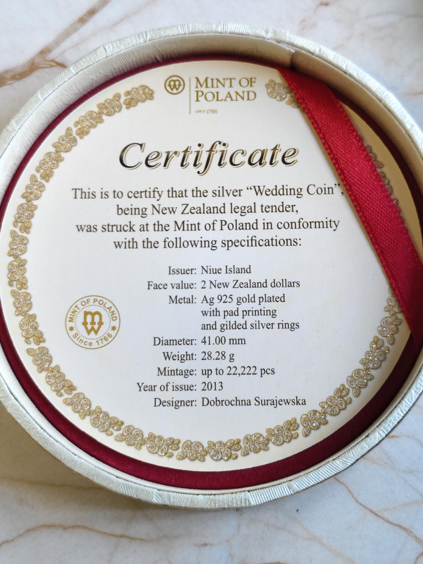 第176期拍卖【长期征集拍品】【欢度国庆中秋双节】 纽埃2013年婚礼彩色镀金镶嵌戒指28.28克纪念银币，发行22222枚银价269