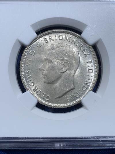 《竞宝斋》第420场 周日，周一，周二  3场连拍 （全场包邮） NGC MS64 澳大利亚1946年乔六2先令银币，袋鼠与鸸鹋。币面清爽干净，观感很好。流通充分的版本，64高分