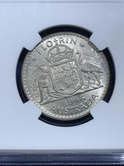 《竞宝斋》第420场 周日，周一，周二  3场连拍 （全场包邮） NGC MS64 澳大利亚1946年乔六2先令银币，袋鼠与鸸鹋。币面清爽干净，观感很好。流通充分的版本，64高分