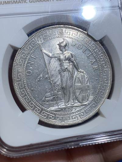 《竞宝斋》第420场 周日，周一，周二  3场连拍 （全场包邮） NGC UNC 英国1899年B版站洋壹元银币 底板转光 状态好 细节见图