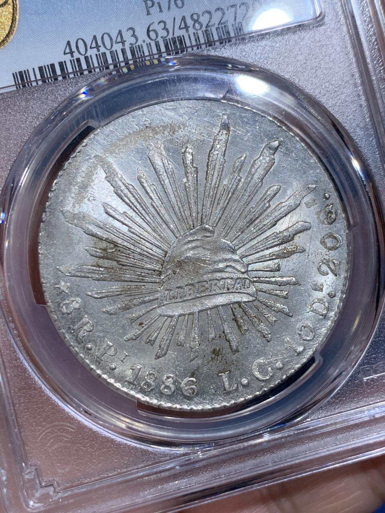 《竞宝斋》第421场 周日，周一，周二  3场连拍 （全场包邮） PCGS MS63 墨西哥1886年鹰洋8瑞尔 圣路易斯波托西PI厂 鉴定师LC 转光佳 少见厂别 高分极少 更高仅3枚