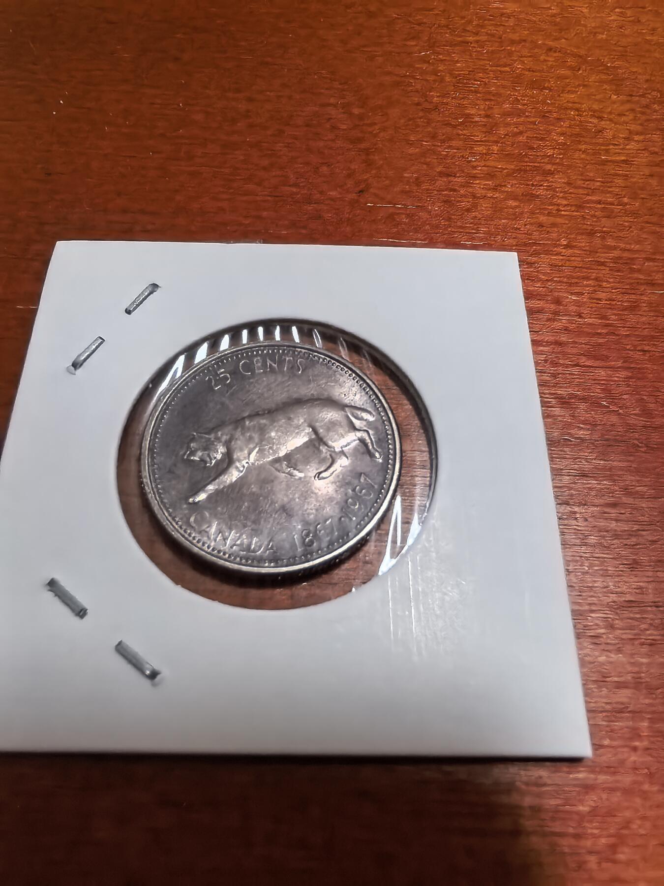 长老汇蛇年精选第五十一场拍卖 1967加拿大伊丽莎白二世猞猁25分银币，玫瑰金包浆