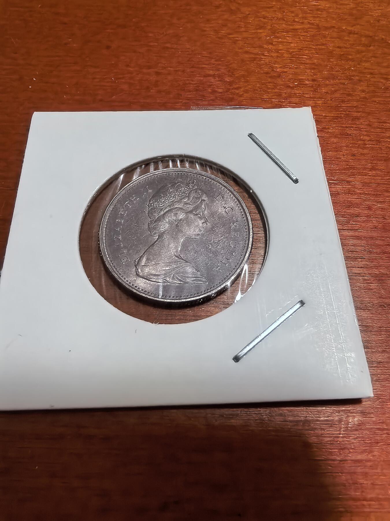 长老汇蛇年精选第五十一场拍卖 1967加拿大伊丽莎白二世猞猁25分银币，玫瑰金包浆