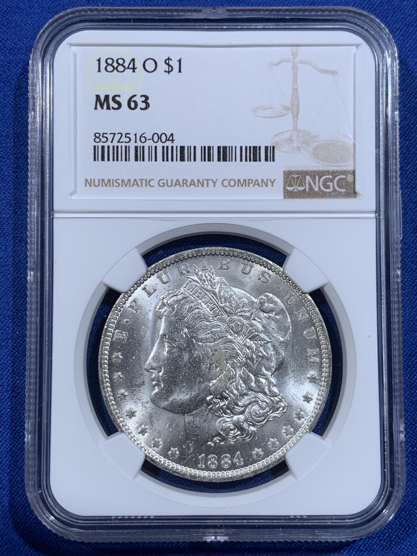 《竞宝斋》第421场 周日，周一，周二  3场连拍 （全场包邮） NGC MS63 美国1884年O版摩根银币，币面干净利落，非常漂亮。