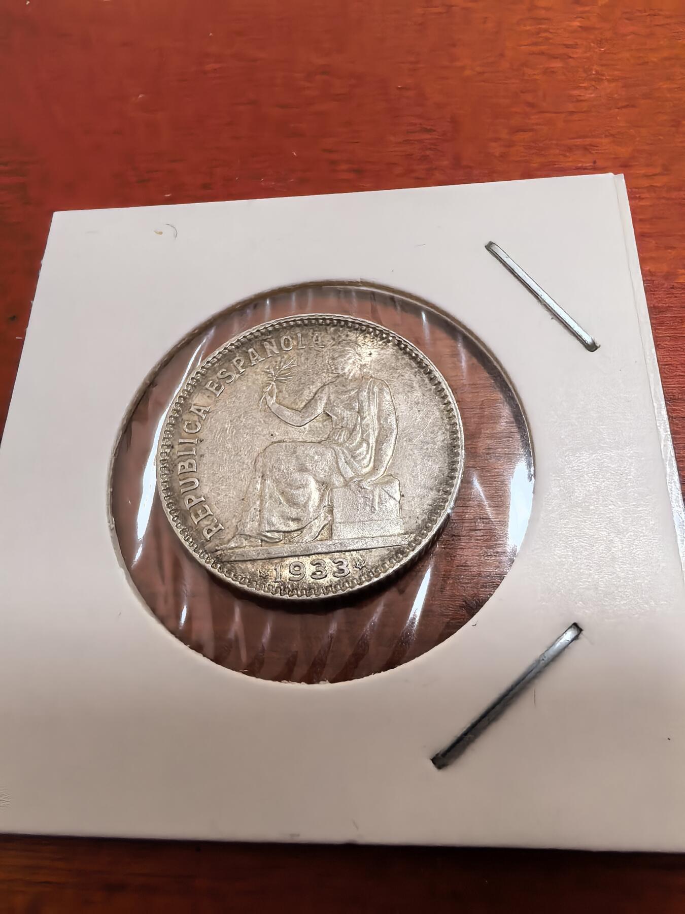 长老汇蛇年精选第五十二场拍卖 1933西班牙拿花1比塞塔银币，独年份，背面极美，45美金