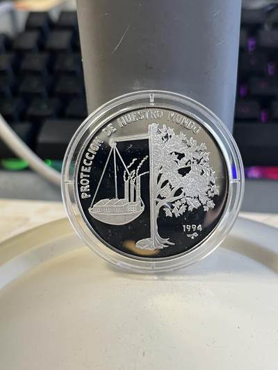 第176期拍卖【长期征集拍品】【欢度国庆中秋双节】 - 古巴1994年保护我们的地球纪念银币，20克，999银，塑料盒有破银价206