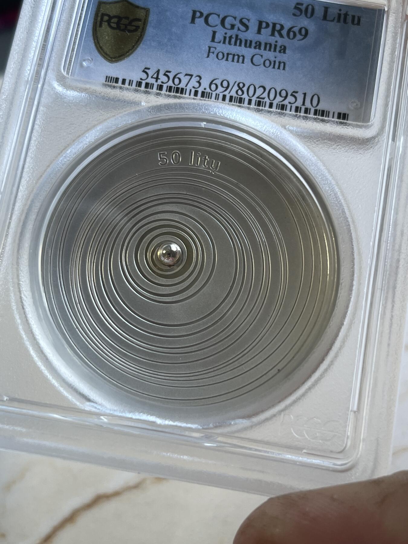 第176期拍卖【长期征集拍品】【欢度国庆中秋双节】 PCGS-PR69DCAM CAMEO 立陶宛2014年最后的拉特弧形镶嵌银珠精制纪念银币-50拉特（波罗的海货币绝唱！28.28克重，925银，43MM，限量发行3000枚，斩获2015年度硬币之星最佳银币第一名及原创技术第二名），无盒证书，评级盒有条裂痕