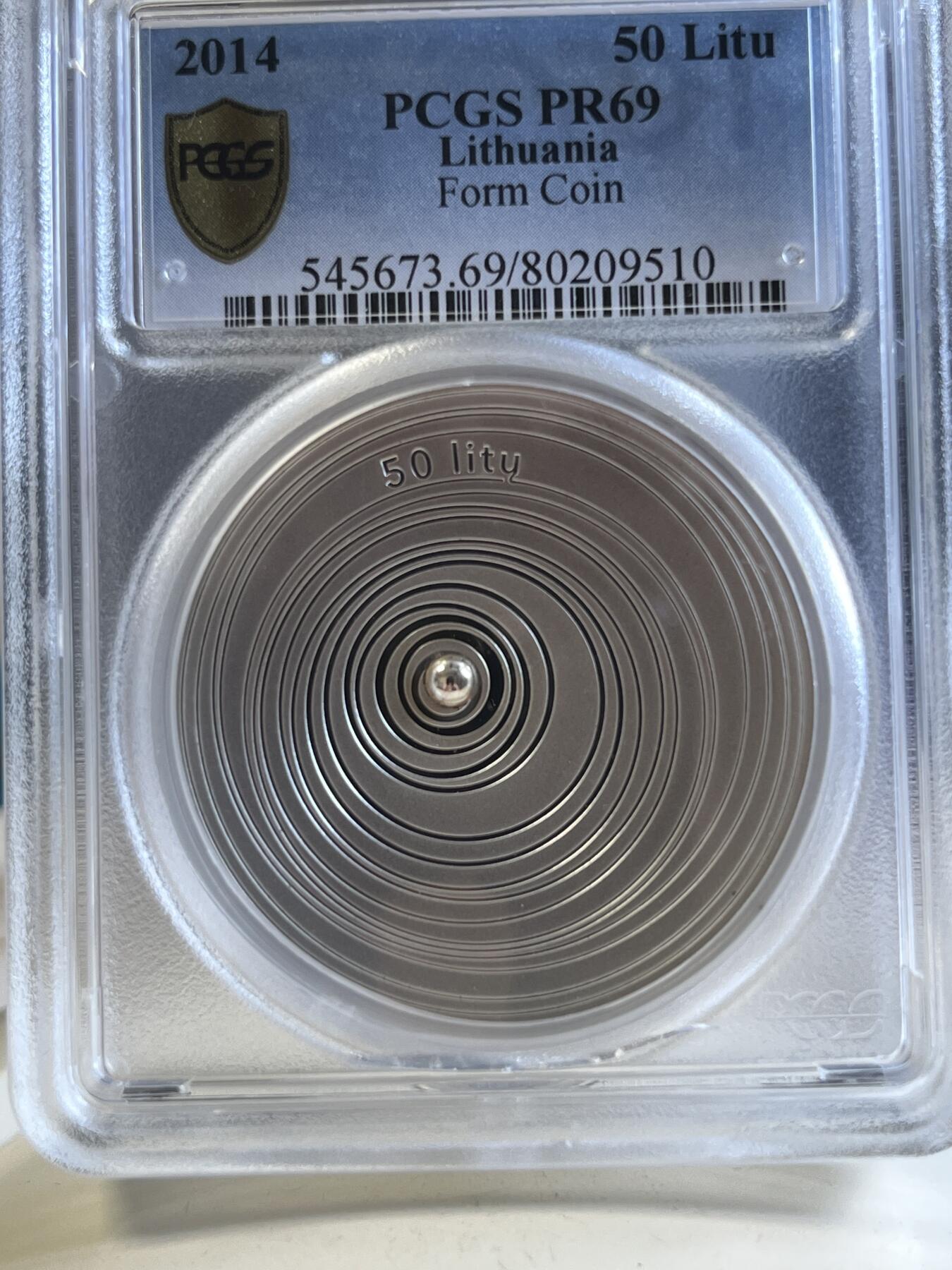 第176期拍卖【长期征集拍品】【欢度国庆中秋双节】 PCGS-PR69DCAM CAMEO 立陶宛2014年最后的拉特弧形镶嵌银珠精制纪念银币-50拉特（波罗的海货币绝唱！28.28克重，925银，43MM，限量发行3000枚，斩获2015年度硬币之星最佳银币第一名及原创技术第二名），无盒证书，评级盒有条裂痕