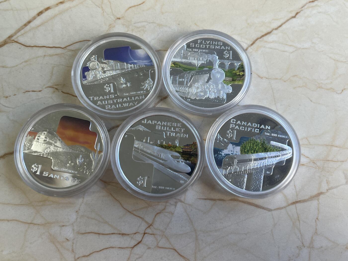 第176期拍卖【长期征集拍品】【欢度国庆中秋双节】 库克2004年世界著名铁路历程1盎司彩色银币5枚。999银，1盎司*5，发行1500套