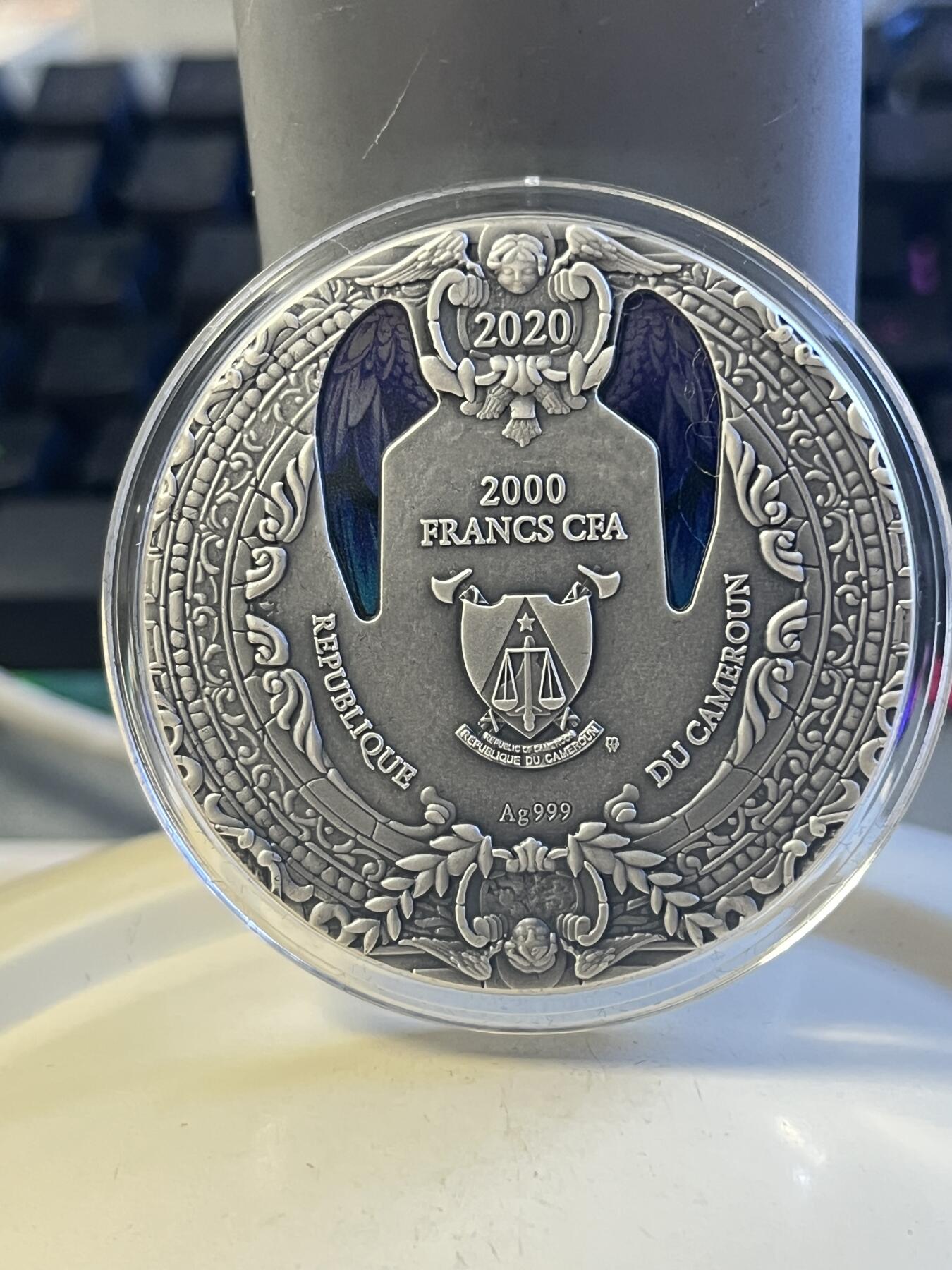 第176期拍卖【长期征集拍品】【欢度国庆中秋双节】 喀麦隆2020年天使系列1加百列镶彩玻璃2盎司银币，999银，发行500枚