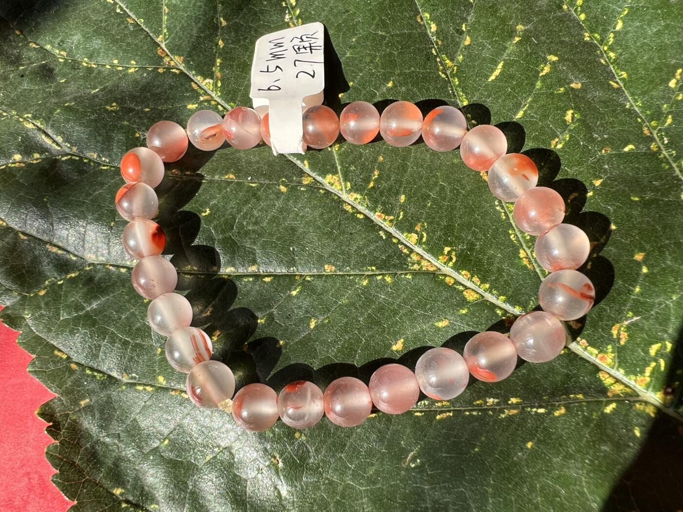 零元拍：清清爽爽粉粉嫩嫩的南红圆珠手串。约10克。6.5MM/27粒